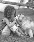 niña con cachorro